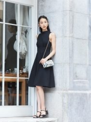 Ms. Arine Koen is a very beautiful & elegant Japanese & Asian beauty fashion model, she is 173 cm, she is tall and slender, she is wearing a dark dress.
