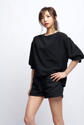 Ms. Akie Shibukawa is a beautiful Japanese & Asian fashion model in black shirt and black shorts, she is standing.