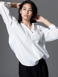 Ms. Mira Nagase is wearing a white long-sleeved shirt and black pants, she is a Japanese & Asian tall fashion model, runway model (catwalk model), her height is 179 cm, she is a tall, slender model.