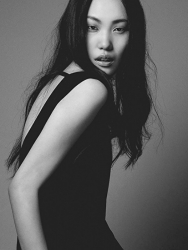 Ms. Yuiko is a Japanese & Asian tall fashion model & catwalk model (runway model), her height is 178 cm, she is a tall, slender model, she is wearing a black dress and is a black and white photo.
