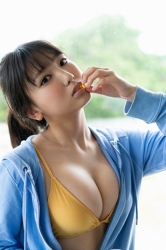 Ms. Aiko Sawashiro is wearing a yellow bikini swimsuit, blue sportswear with long sleeves to reveal her big breasts, she is a sweet and cute young Japanese & Asian graphic bikini model (gravure idol, swimwear model, pin-up girl), TV personality, actress, her bust is 88 cm, she has a mesmerizing big breasts, beautiful breasts, she is an attractive woman.