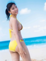 Ms. Aiko Sawashiro is wearing a yellow bikini swimsuit, she is standing on a beach and shows her back, she is a sweet and cute young Japanese & Asian bikini model (gravure idol, swimwear model, pin-up girl), TV personality, actress, her bust is 88 cm, she has mesmerizing big breasts, beautiful breasts, she is sexual glamour women.