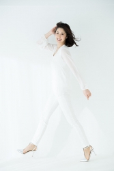 Ms. Keina Ashikubo's clothes are all white up and down, she is walking, she is a Japanese & Asian mature beauty fashion model, her height is 170 cm and her figure is very slim and beautiful, elegant.