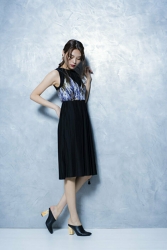 Ms. Eri Noina is wearing a black dress (with blue flame design), she is standing in black shoes, she is a tall and beautiful Japanese & Asian fashion female model, parts model, her height is 171 cm, she is tall and slender beauty woman.