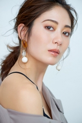 Ms. Hikane Doki is wearing a gray blouse, she is a Japanese & Asian fashion beauty model.