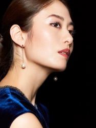 Ms. Hikane Doki is wearing a blue blouse, she is a Japanese & Asian fashion beauty model.