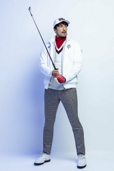 Mr. Rodrigue Takise is wearing a white jacket and gray trousers and holding a golf club, he is a half Japanese half French handsome mixed-race male model.