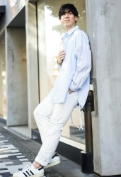 Mr. Ryuutarou Oshikoshi is wearing a light blue short-sleeved shirt, white trousers, white sneakers, he is a Japanese & Asian handsome fashion model.