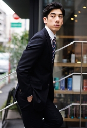 Mr. Ryuutarou Oshikoshi wears a dark blue suit, he is a Japanese & Asian handsome fashion model.