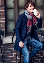 Mr. Takaatsu Sakurahaba is wearing blue clothes, he is sitting, he is a handsome Japanese & Asian actor, fashion male model.