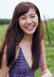 Ms. Ririna Oasa is a Japanese-Chinese mixed-race beauty fashion model & swimsuit model, underwear model wearing a purple-blue bikini swimsuit, she is in the grass, her height is 172 cm and she is tall, her style is very good, she is an Asian model.