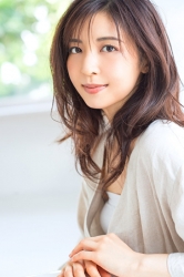 Ms. Akie Shibukawa is a beautiful model in Japanese & Asian fashion model wearing a beige women's suit and white shirt.