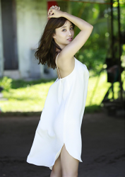 Ms. Ayaka Shibaie expresses her sexy in a white dress, she is standing, she is a beautiful & cute Japanese & Asian model, freelance announcer, TV personality.
