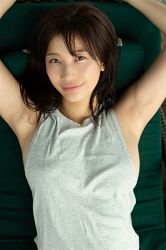 Ms. Ayuu Koichi wears a light gray running shirt, she is lying on a green chair, she is a beautiful Japanese & Asian big breasts TV entertainer, bikini model (gravure idol, swimwear model), actress.