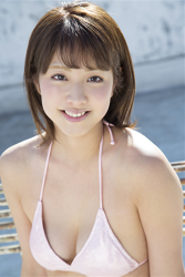 Very cute Japanese & Asian beautiful & cute gravure idol (bikini model), actress, TV personality, her name is Ms. Arian and she is wearing a pink bikini swimsuit.