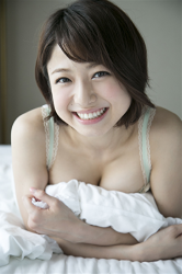 Ms. Chizuka Nakagoe is wearing light yellow-green lingerie, she is lying on the bed with a pillow, she is a Japanese & Asian sweet and cute TV personality, swimsuit female model, actress, her bust is 88 cm, she has a big breasts, beautiful breasts, she is a sexually attractive woman.