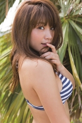 Ms. Ikuho is wearing a blue and white horizontal striped bikini swimsuit, she is standing, she is a Japanese & Asian beautiful and famous model, gravure idol (bikini model, swimsuit model, pin-up girl), TV personality, her bust is 83 cm, she has beautiful breasts.