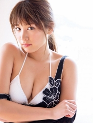 Ms. Ikuho is wearing a white bikini swimsuit, she wears a navy blue camisole over a white bikini, she is a Japanese & Asian beautiful and famous model, gravure idol (bikini model, swimsuit model, pin-up girl), TV personality, her bust is 83 cm, and she has beautiful breasts.