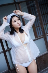 Ms. Aiko Sawashiro is wearing a white bikini swimwuit, she wears a raincoat, she is a sweet and cute young Japanese & Asian gravure idol (bikini model, swimsuit model, pin-up girl), TV personality, actress, her bust is 88 cm, she has fascinating big breasts, beautiful breasts, she is sexual glamour women.