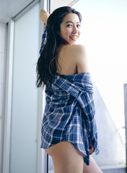 Ms. Aisui Saito is wearing a blue plaid long-sleeved shirt, she is standing by the window, she is a Japanese & Asian beautiful and sexy gravure idol (bikini model, swimsuit model, pin-up girl) actress, her bust is 85 cm, she has beautiful breasts, she is sexually attractive female.