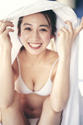 Ms. Aisui Saito is sitting on the bed in a white bikini, she has a white sheet on her head, she is a beautiful and sexy Japanese & Asian gravure idol (bikini model, swimsuit model, pin-up girl), actress, her bust is 85 cm, she has beautiful breasts, she is a woman with sexual charm.