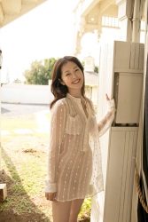 Ms. Yuuri Fuefuki is wearing a (translucent) white blouse and beige lingerie, she is standing in the garden, she is a Japanese & Asian intellectual and delicate mature beauty actress & model, her title is actress, she has done a little modeling business.