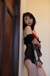 Ms. Nonomi Oie is wearing (translucent) black cardigan & red underwear, she is standing, she is a Japanese & Asian fashion female model, TV entertainer, she used to be a gravure idol (bikini model, swimwear model), her bust is 83cm, she has beautiful breasts.