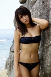 Ms. Ikuho Hisazato is a Japanese & Asian beautiful and famous model, gravure idol (bikini model, swimsuit model, pin-up girl), TV personality, she is standing in a denim bikini, her bust is 83 cm, and she has beautiful breasts.