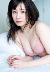 Ms. Kirara is wearing pink lingerie on the bed, she is a cute Japanese & Asian sweet and cute gravure idol (bikini model, swimsuit model pin-up girl), actress who used to be an idol singer.