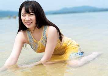 Ms. Kirara Takazuma wears a yellow summer dress and is a little immersed in the river, she used to be an idol singer, and she is now a sweet and cute Japanese & Asian actress, gravure idol (bikini model, swimsuit model pin-up girl).