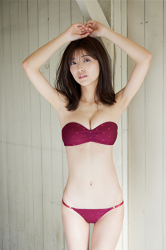 Ms. Yuo Etoku is wearing red bikini swimwear, she is standing in the room, she is a pure and beautiful Japanese model, bikini model (gravure idol, swimwear model), actress.