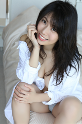 Ms. Hifumi is wearing a very large white shirt and gray panties, sitting on the bed, her breasts can almost be seen, her bust is 96 cm, she is a Japanese & Asian sexy big breasts bikini model & actress, , she is a sexually attractive woman.