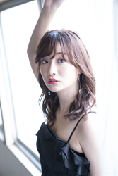 Ms. Ayaka Shibaie is wearing a black dress, she is standing by the window, she is a beautiful & cute Japanese & Asian model, freelance announcer, TV personality.