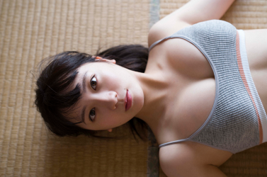 Ms. Kirara Takazuma took off her dark shirt and showed her gray lingerie, she is lying on the tatami in an old Japanese house, she is a sweet and cute Japanese & Asian gravure idol (bikini model, swimsuit model pin-up girl), actress.