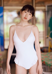 The beautiful and elegant Japanese & Asian gravure idol (pin-up model), actress & singer in a white swimsuit, her name is Ms. Mikoto, she is standing.