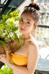 Ms. Yaaya Igeta is wearing a yellow bikini swimsuit, she is standing, she holds a houseplant in her hand, she is a Japanese & Asian big breast gravure idol (bikini model, swimsuit model, pin-up girl), actress, TV personality, her bust is 92 cm, she has attractive big breasts, she is a woman with sexual charm.