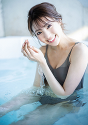 Ms. Yuina is immersed in the bathtub in a gray swimsuit, she is a Japanese & Asian fashion model, actress and swimsuit model (gravure idol, bikini model).