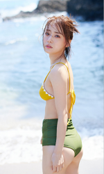 Ms. Yumina Fukue is wearing a swimsuit, the color of the swimsuit is yellow bra, green panties, she is standing by the sea, she is a beautiful and cute Japanese & Asian TV personality, gravure idol (bikini model, swimwear model, pin-up model).