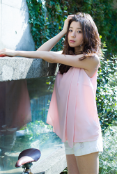 Ms. Ayami Asashige is wearing a pink shirt, white shorts, she is standing, she is a tall Japanese & Asian beautiful and elegant fashion model, gravure idol (bikini model, swimsuit model, pin-up model), TV entertainer, actress.