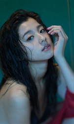 This is a close-up photo of her, she is closing her eyes, Ms. Ayami Asashige is a beautiful and elegant Japanese & Asian tall fashion model, gravure idol (bikini model, swimwear model, pin-up model), TV personality, actress.