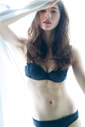 Ms. Ayami Asashige is wearing black lingerie, she is standing by the white curtains, she is a beautiful and elegant Japanese & Asian tall fashion model, gravure idol (bikini model, swimwear model, pin-up model), TV personality, and actress.