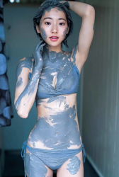Ms. Karena Takeoka is wearing a light blue bikini swimsuit, she becomes muddy, she is standing now, she is a cute and elegant Japanese actress (Asian actress), bikini model (gravure idol, swimsuit model, pin-up model), fashion model.