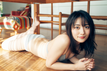 Ms. Kazuki Okuike is wearing gray lingerie, she is lying prone on the floor, she is a beautiful and elegant Japanese & Asian fashion model, gravure idol (bikini model, swimsuit model, pin-up model), Actress, her bust is 83cm and she has beautiful breasts.