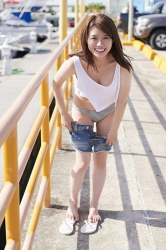 Ms. Maaya Iune is wearing a white running shirt and is taking off her denim shorts, show black and white striped pants, she is a beautiful and cute Japanese & Asian gravure idol (bikini model, swimwear model, pin-up girl), TV personality, and she has beautiful breasts.