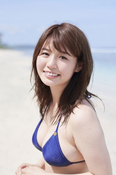 Ms. Maaya Iune is wearing a blue bikini swimsuit, she is standing on the beach, she is a beautiful and cute Japanese & Asian gravure idol (bikini model, swimwear model, pin-up girl), TV personality, she has beautiful breasts.