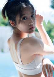 Ms. Mioka Imawatari wears white sports bra and jeans, she is a beautiful and cute Japanese actress (Asian actress), gravure idol (bikini model, swimsuit model, pin-up model), TV personality, her bust is 86cm and she has beautiful breasts.