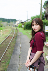 Ms. Nanane Oka is waiting for the train, she wears a red short-sleeved blouse and a purple skirt, she is a beautiful and cute Japanese & Asian gravure idol (bikini model, swimsuit model, pin-up girl) and actress.