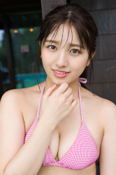 Ms. Nanane Oka is wearing a pink bikini swimsuit, she is photographed close-up, she is a beautiful and cute Japanese & Asian gravure idol (bikini model, swimsuit model, pin-up girl) and actress.