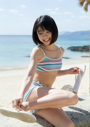 Ms. Natsuyo Ikekatsu wore a colorful bikini swimsuit, she is sitting on the beach, she is a Japanese & Asian beautiful and cute model & actress.