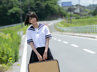 Ms. Natsuyo Ikekatsu is wearing a school uniform, and she is standing on the road with a bag, she is a Japanese & Asian beautiful and cute model & actress.
